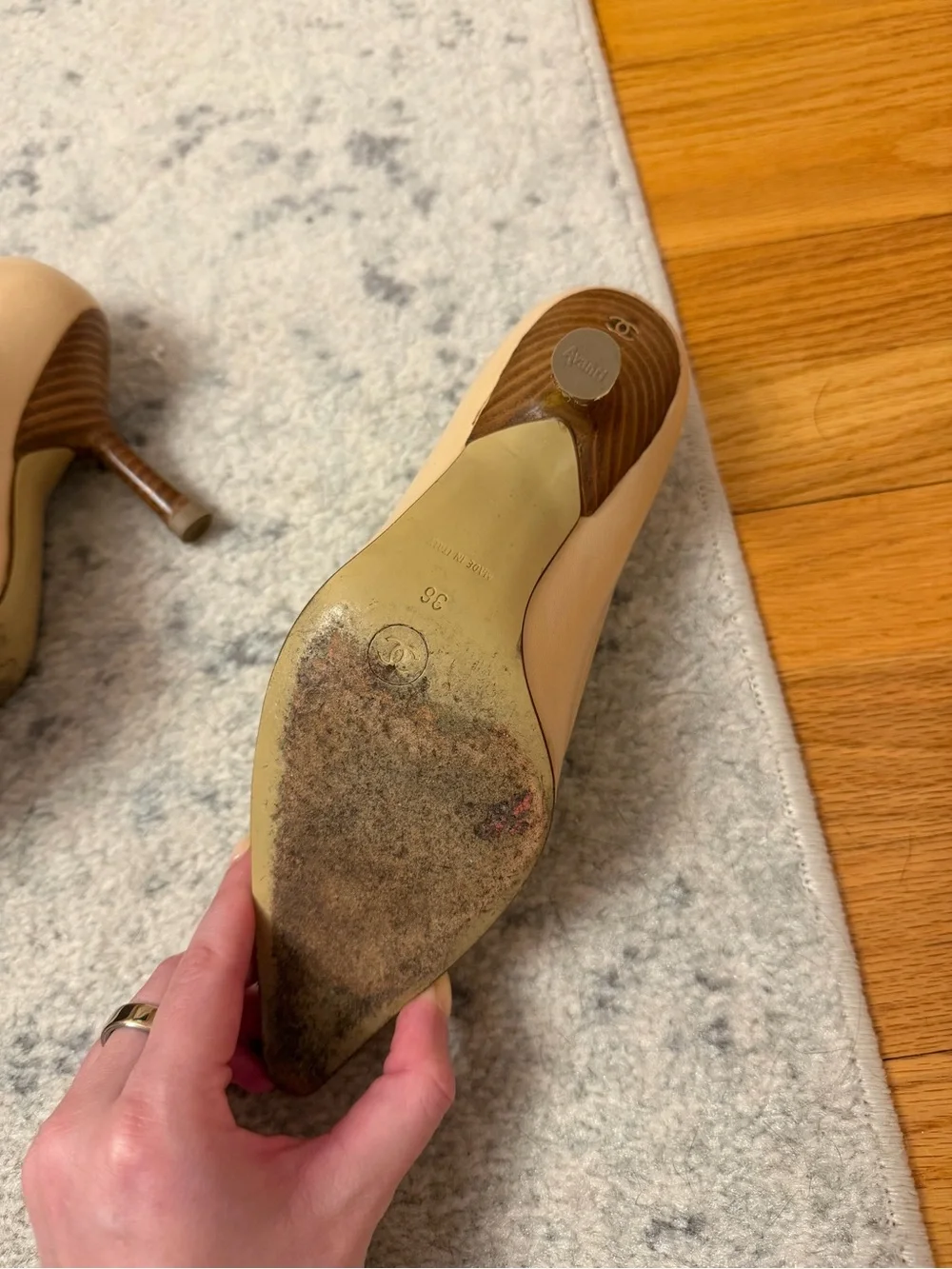CHANEL Beige Pointed-Toe Leather Pumps with Bow and CC Charm